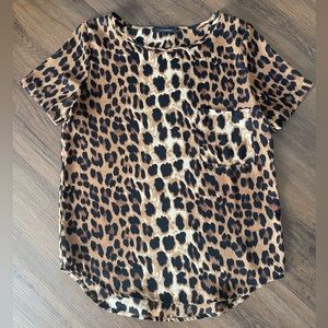 Oliviaceous leopard print top - subtly sheer - with pocket.
